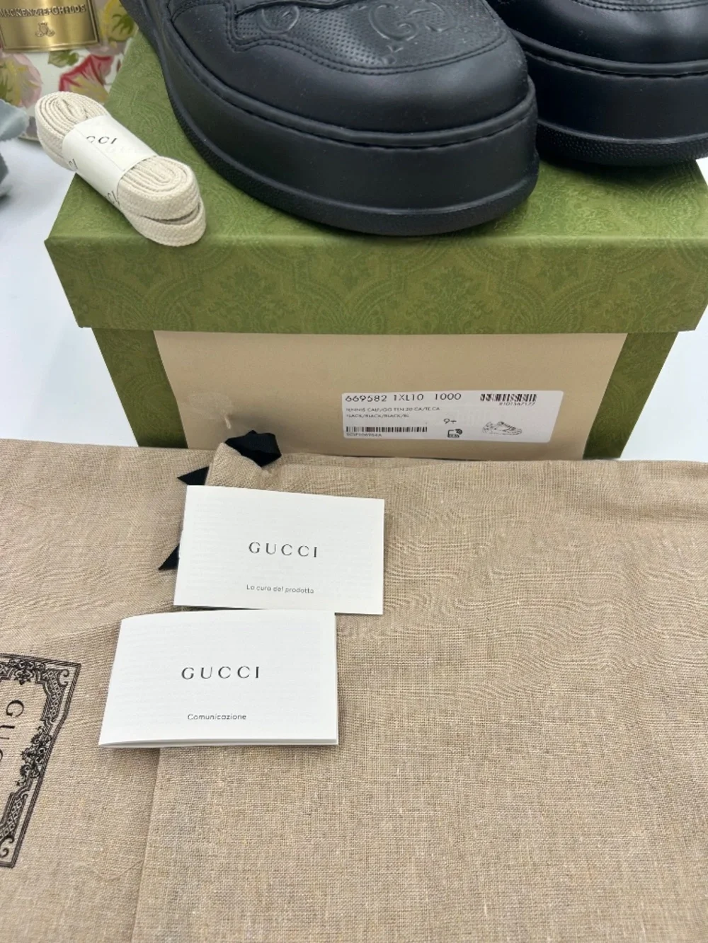 Men’s Gucci GG Embossed Leather Sneakers.  Size 9.5.(fits 10.5). Made in Italy.